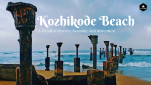 Scenic view of Kozhikode Beach during sunset: golden hues reflecting on the waves, fishing boats anchored near the shore, and people strolling along the sandy beach, soaking in the serene coastal atmosphere.